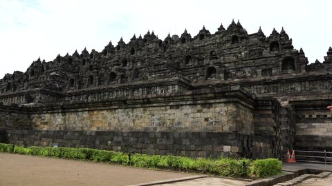 Magelang - December, 2021 : Borobudur is a Mahayana Buddhist temple in Magelang Regency. It is the world's largest Buddhist temple. The temple consists of nine stacked platforms, six square. 