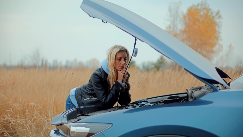 Auto Failure Accident Inspection Oil Level. Frustrated Girl Repairing Damage Car. Sad Disappointed Woman On Broken Car Accident. Vehicle Check Engine Oil Level. Car Engine Overheating. Open Hood Motor Royalty-Free Stock Footage #1083691126