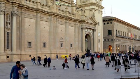 ZARAGOZA, SPAIN. October 30, 2021. People walking in the Plaza del Pilar next to the Cathedral of Nuestra Señora del Pilar thanks to the high rate of population vaccinated against covid-19.