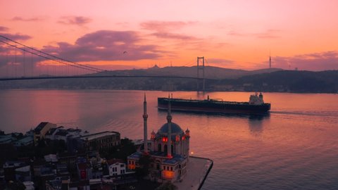 Aerial Ortakoy Mosque view with beautiful sunrise, Bosphorus Bridge, Istanbul Turkey