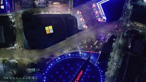 Los Angeles, California. United States. Circa, 2019. Staples Center. Overhead Aerial View of The Multi-Purpose Arena in LA. Famous Brands and Logos At Night. The Ritz Carlton, Microsoft, Herbal Life.