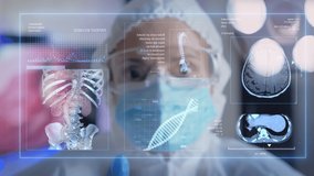 Doctor analyses patient health using augmented reality holographic display interacting in a virtual interface. - Powered by Shutterstock - Get 15% off with code: PIKWIZARD15