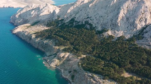 Lush Green Forest On Rocky Mountains In The Island Of Krk In Croatia. aerial