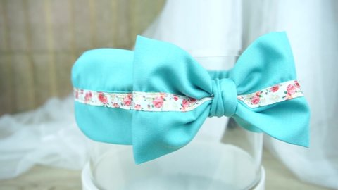 Handmade simple headband made out of cotton fabric with bow pattern, great as hair accessories for women and girls.