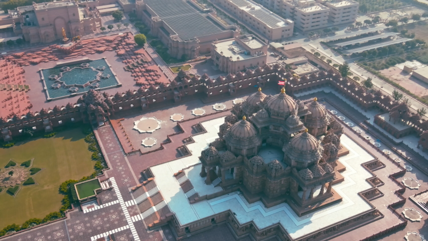Aerial shot of Akshardham Temple in New Delhi, India. Drone view of a Hindu temple in India. Akshardham complex is a Hindu temple, and a spiritual-cultural campus in Delhi, India.