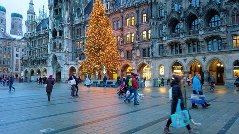 MUNICH, GERMANY, EUROPE - CIRCA 2021: Walking in munich marienpaltz december winter 2021 marienplatz square germany chritmas snow.