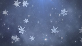 This stock motion graphics video shows shiny snowflakes falling with glittering particles in a seamless loop.