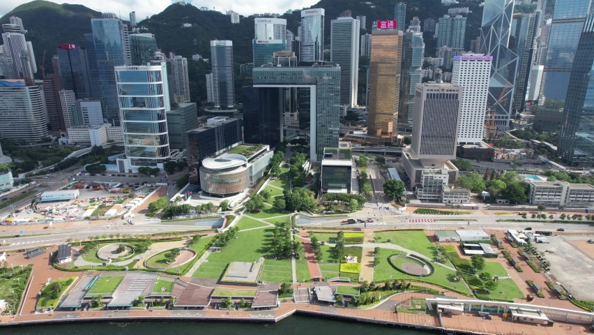 City Aerial in Hong Kong Island 4K Aerial shot of the premium residential area at mid level and the central financial business along the sides of the Victoria Harbour | Shutterstock HD Video #1083747454