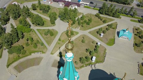 The Cathedral of the Assumption of the Blessed Virgin Mary, panoramic views of the city. Omsk, Russia, Aerial View Hyperlapse