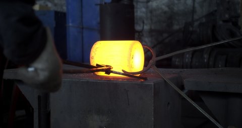 Forging of hot metal. Production of heavy industry and large metal structures.Modern steel industry.