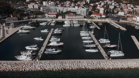 Flight over the marina and yachts, the city of Herceg Novi