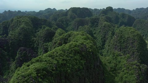 aerial drone shot of mountain island archipelago in Nonh Binh National Park, Vietnam. Main shooting location of King Kong movie.