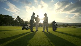 Group of Asian people businessman and senior CEO enjoy outdoor sport lifestyle golfing together at golf country club. Healthy men golfer shaking hand after finish game on golf course at summer sunset - Powered by Shutterstock - Get 15% off with code: PIKWIZARD15