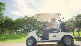 Group of Asian people businessman and senior CEO enjoy outdoor activity lifestyle sport golfing together at golf country club. Healthy men golfer driving golf cart on golf course in summer sunny day - Powered by Shutterstock - Get 15% off with code: PIKWIZARD15