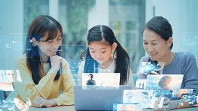 Asian family watching hologram screens. Digital contents. Video distribution service. - Powered by Shutterstock - Get 15% off with code: PIKWIZARD15