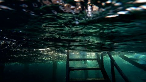 Ladder to heaven concept.
Ocean underwater scene with light rays. Nature background. Red sea.