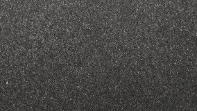 Black foam texture. Background cell of plastic foam black white. 4K UHD video footage 3840X2160.