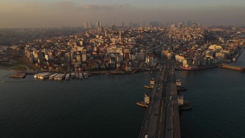 Aerial, sunset and evening views of Bosphorus, Galata Tower, Galata Bridge, Golden Horn views Turkey, Karaköy and Fatih districts from above and historical places from the Ottoman Empire