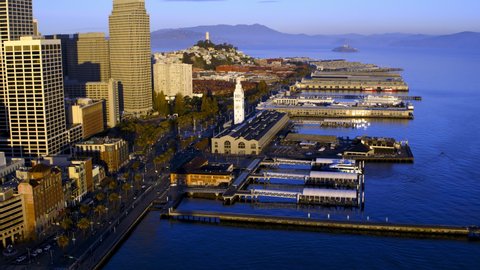 San Francisco California USA Waterfront Nov 2021. Great Aerial Drone Fly Over view of the San Francisco Waterfront with Piers, Coit, SF Bay, Alcatraz Island and Mt.Tamalpias looming in the distance
