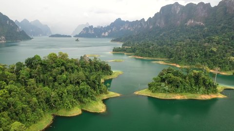 Drone view of forest covered rocks and mountains in Khao Sok National Park, Thailand