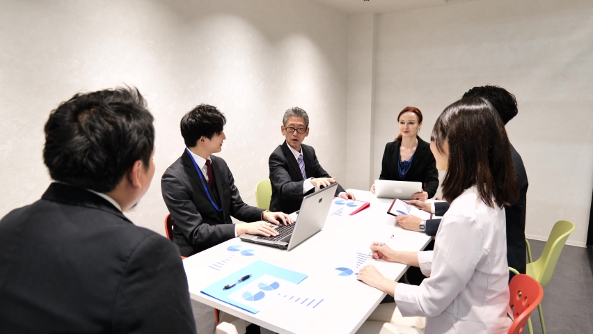 Businesspersons having a meeting in an office Royalty-Free Stock Footage #1083855949
