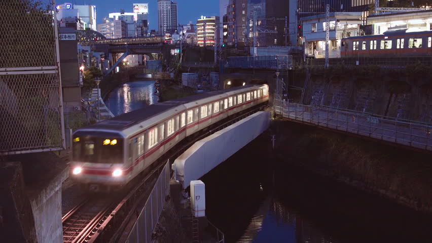 Multiple train lines coverage at train station, Tokyo, Japan, at night. | Shutterstock HD Video #10838561