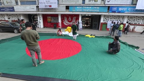 Dhaka, Bangladesh - December 14, 2021: 'Slogan 71' at Dhaka University is making the national flag in the form of the first flag of Bangladesh on the occasion of the golden jubilee of independence.