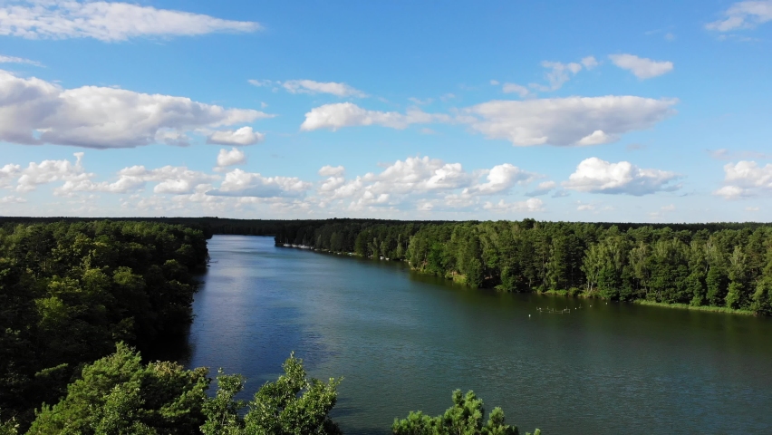 Lake and green forest in Tuchola national park, Poland. Summer landscape in Europe.