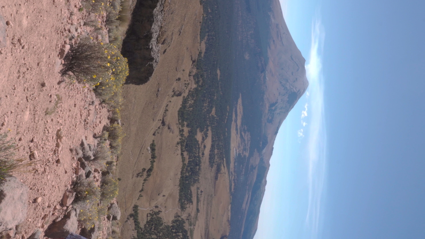 The silhouette of a man admiring the popocatepetl volcano