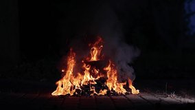 Burning fire in an old broken TV set, toxic air pollution from burning plastics of tube CRT television, slow motion from 120 fps footage - Powered by Shutterstock - Get 15% off with code: PIKWIZARD15