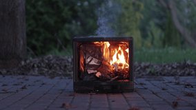 Burning fire in an old broken TV set, toxic air pollution from burning plastics of tube CRT television - Powered by Shutterstock - Get 15% off with code: PIKWIZARD15