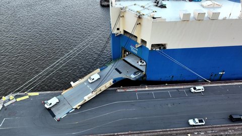 Overhead Aerial View of Vehicles Being Loaded and Unloaded from a Vehicle Carrier Ship Delaware River Philadelphia