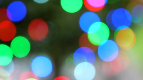 Fairy light on a Christmas tree festive blurred bokeh abstract background 