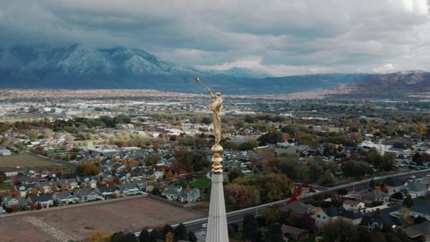 South Jordon , Utah , United States - 10 01 2021: golden Angel Moroni statue at Brigham Jordan Utah