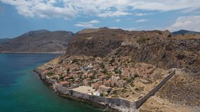 Aerial drone video of beautiful castle and medieval old city of Monemvasia in the heart of Lakonia, Peloponnese, Greece