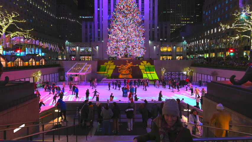 NEW YORK, NEW YORK – DECEMBER 12: A crowd of people visits to look the Christmas tree in Rockefeller Center in Sunday night on December 12, 2021in New York City NY USA.