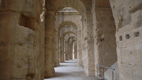 Walking Through Passage Of Ancient Amphitheater In El Jem, Tunisia. Tracking