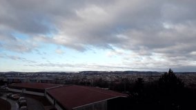 Time-lapse video, a view of the city of Brno in the morning, over which the clouds are moving fast and finally the sun rises