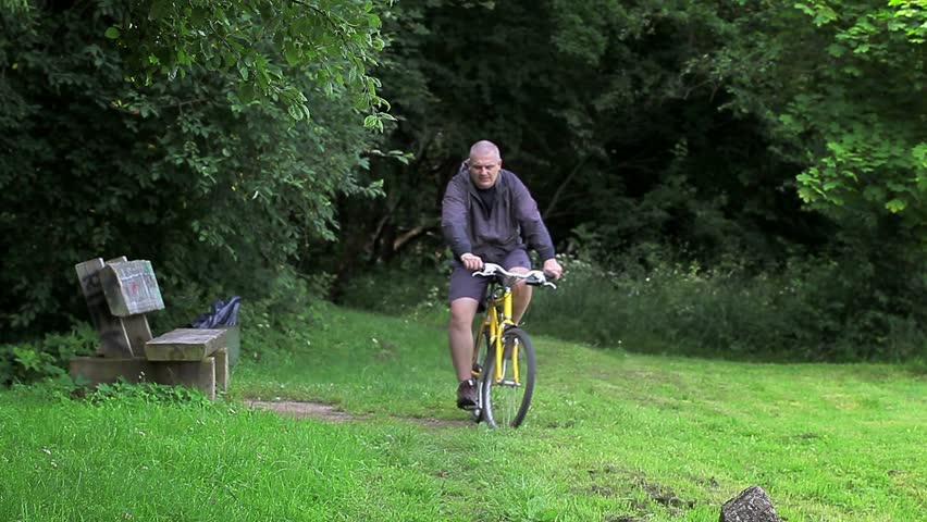 Man ride bicycle in the park
