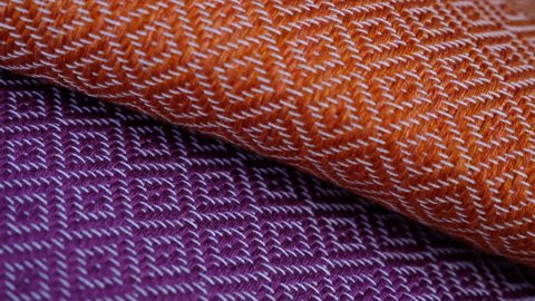 Traditional Moroccan cotton fabric in purple, magenta, orange. Can be used as bedcover, throw, cushions, and cloths, or as beach towel. Traditional geometric shape design.