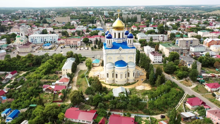 Aerial view of the Ascension Cathedral and residential areas on a summer day in Yelets Royalty-Free Stock Footage #1083965950