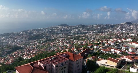 Capital of Funchal on Madeira island, Portugal beautifull panorma view over the hills and mountains on a sunny day.