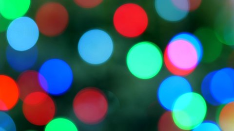Fairy light on a Christmas tree festive blurred bokeh abstract background
