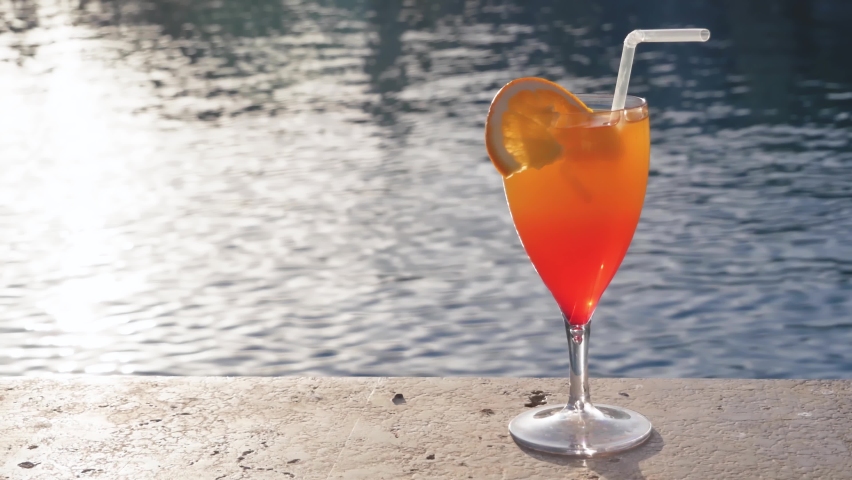 Sex on the beach Cocktail near the swimming pool. Delicious beverages. Holiday and relaxtion concept, closeup