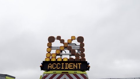 Vendenheim, France - Circa 2021: Gruau French emergency signage car with Ralentir signage text on the led panel board translated as Slow Down seen on the highway in France