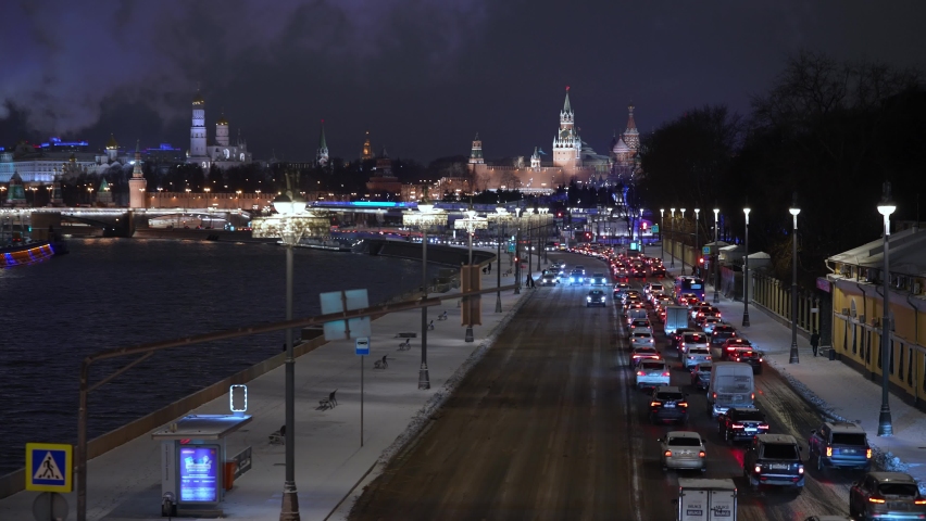 Winter cityscape at night. Traffic jam near the Moscow Kremlin in winter and evening