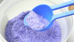 Natural salt with lavender, super food for the skin. Health care spa with lavender extracts. Video 4k.