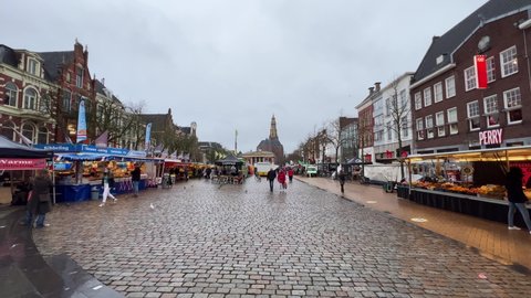 GRONINGEN, NETHERLANDS - 17. DECEMBER 2021: Steady shot of Fish market square in the student city of Groningen during winter