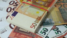 Pack Of Euro Bills On Table