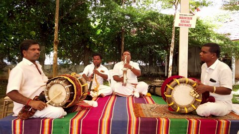 Bangalore, Karnataka, India-November 17 2021;The Traditional musicians playing their instruments Volga, drums, saxophone and shenoy in a Hindu wedding ceremony in Bangalore, India.

